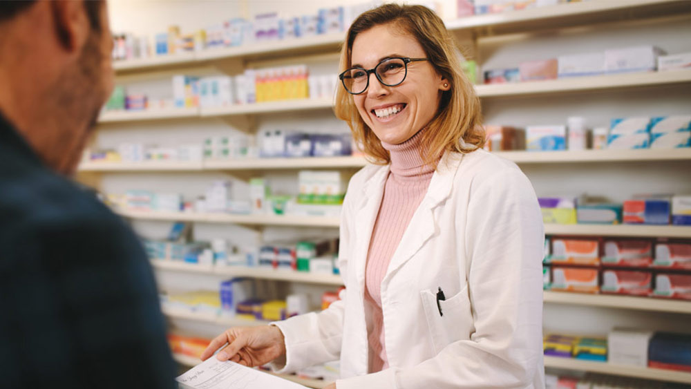 female-pharmacist-with-customer